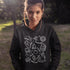 Warning: wearing this hoodie may cause spontaneous road trips, extreme s’mores cravings, and uncontrollable urges to yell “I got the firewood!”
